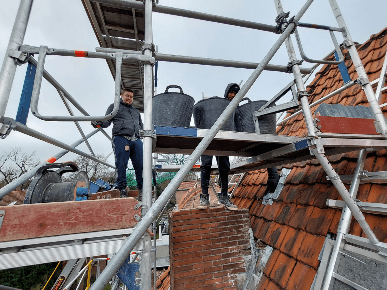 Draagmuur doorbraak & HEA-ligger voor moderne leefkeuken.